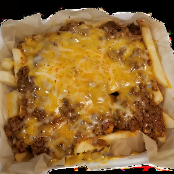 A close-up of Blazing Chicken Shack II's chili cheese fries, loaded with melted cheese and ground meat.